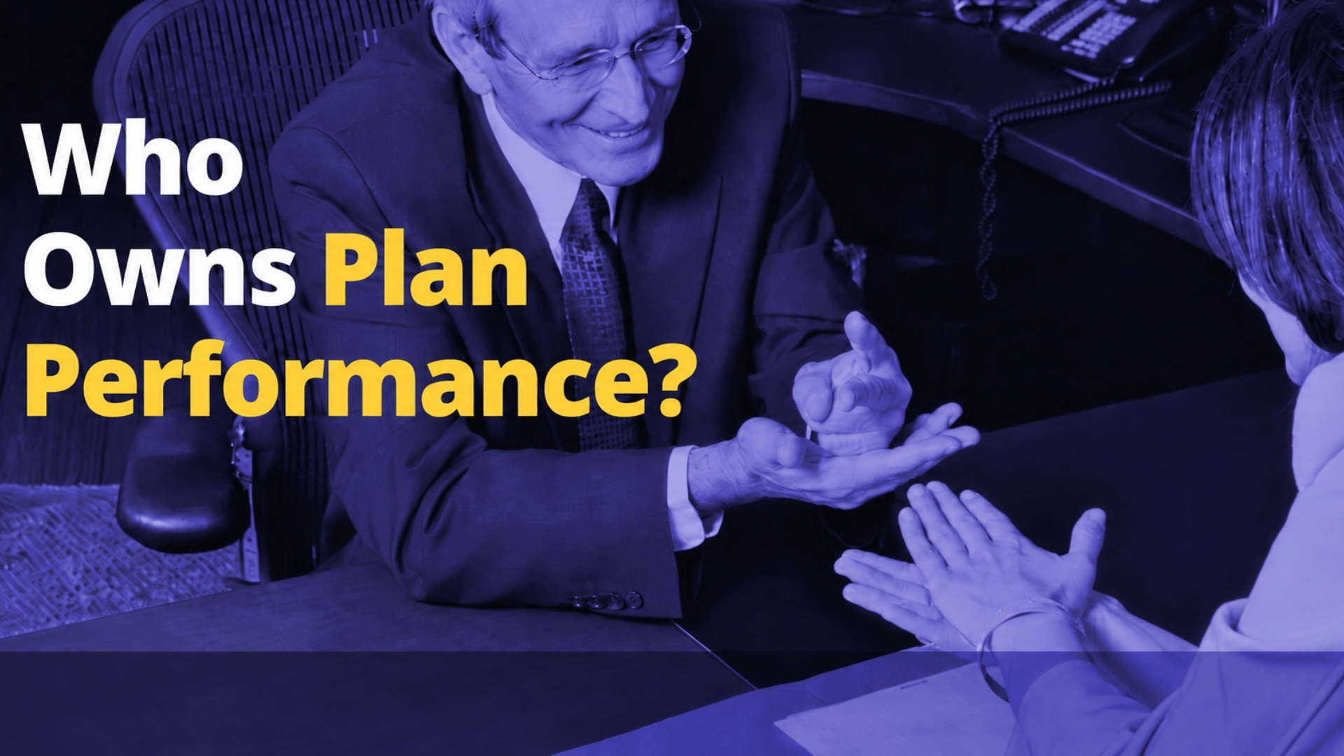 Who Owns Plan Performance? — two professionals in discussion at a desk, with the Wellnecity logo